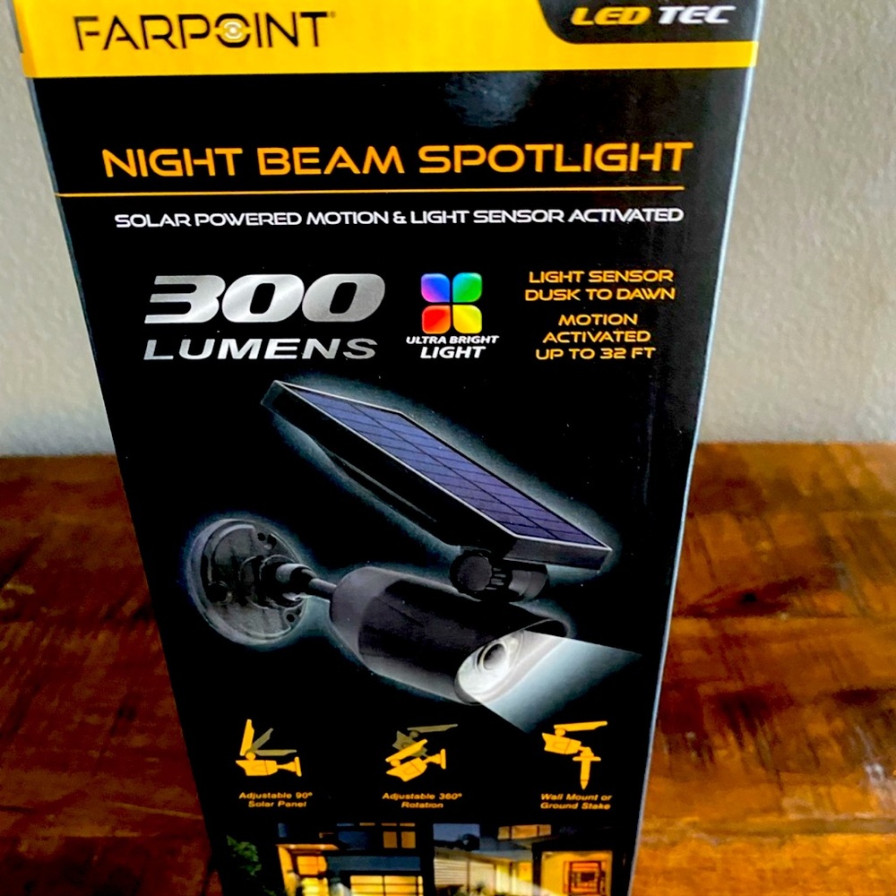 Solar powered 300 linens night beam spotlight with light sensor motion activated